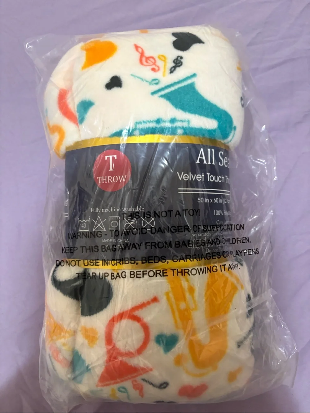 Target White Fleece Throw Blanket with Multicolor Music Print
